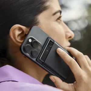 PLAUD Note Pro attached to a smartphone during a phone call, shown in a hand-held lifestyle shot