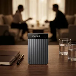 PLAUD Note Pro black AI transcription device on a table in a meeting setting